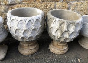 A pair of composite stone two piece planters, 49cmH