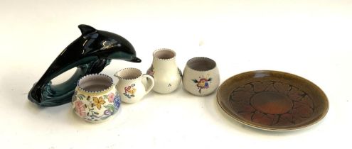 A quantity of Poole pottery to include an Aegean plate, Dolphin and vases (6)