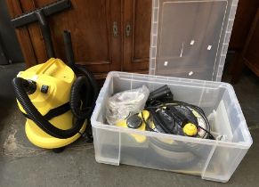 A Karcher vacuum cleaner, together with accessories