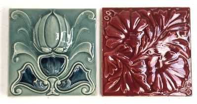 Two Art Nouveau glazed tiles, one by Craven Dunnill Jackfield, the other J.C. Edwards, each