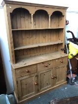 A pine kitchen dresser, 141x44x201cmH