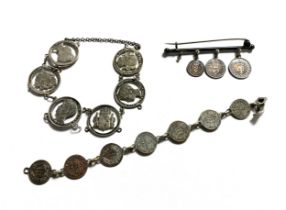 A quantity of coin jewellery to include bracelet made from pierced Spanish coins, bar brooch with