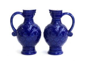A pair of blue glaze Minton jugs, pattern no. 596, 21cmH