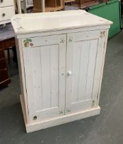 A white painted cabinet decorated with hand painted Beatrix Potter characters, 88cmW