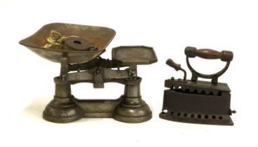 A set of vintage kitchen scales, with weights; together with a box iron