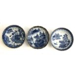 Three late 18th century Chinese export blue and white dishes with clobbered gilt decoration, each