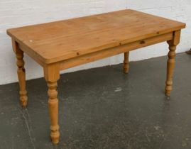 A pine kitchen table, 148x82x78cm