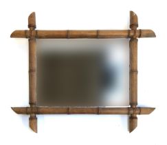 A faux bamboo rectangular wall mirror, 53x43cm