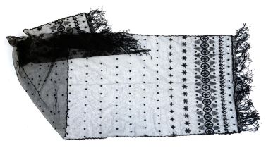 A black lace scarf with applied decoration; together with a black handbag and a yellow mohair