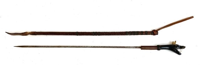 An early 20th century leather horse whip with concealed steel hunting spike, the handle with