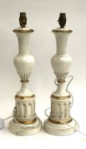 A pair of painted and parcel gilt turned wood table lamps, 51cmH overall