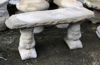 A composite stone bench with squirrel supports, 43cmH