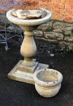 A composite stone bird bath (af), 71cmH, together with a composite stone planter, 28cmD