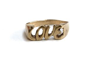 A 9ct gold 'Love' ring, size N 1/2, 3g