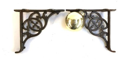 A pair of steel wall brackets; together with a large antique bauble, approx. 9.5cmD