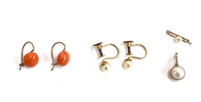 A pair of Victorian small coral cabochon earrings on yellow metal wires, 0.7cmD, 1g; together with a
