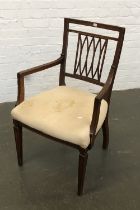 A George III square back open armchair