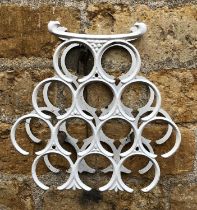 A metal 12 bottle wine rack in the form of an owl