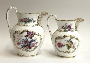 Two 19th century porcelain jugs, hand painted floral pattern heightened in gilt, dense dendritic