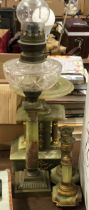 An onyx and gilt metal table lamp, 36cmH to top of fitting; an onyx and cut glass oil lamp with