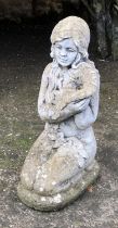 A composite stone water feature in the form of a lady holding a flower, 63cmH