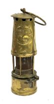 A brass miners 'Protector Lamp, Eccles, Manchester', 27cmH