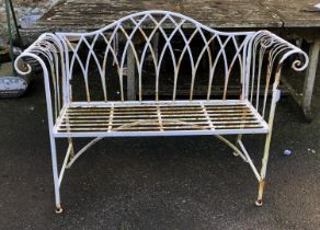 A wrought metal garden bench, approx. 129cmW