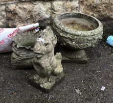 A composite stone urn planter, 38cmD, together with a planter in the form of a sack and a water