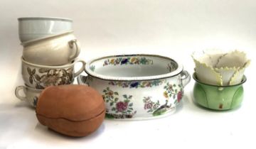 A large twin handled porcelain planter; together with various chamber pots