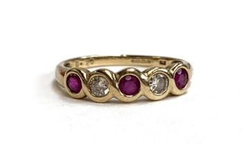 A 9ct gold ring set with rubies and diamonds, size O, 1.9g