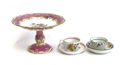 A pink porcelain plate on stand hand painted with floral decoration and heightened in gilt, rd no.