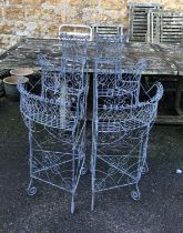 A pair of wrought metal corner plant stands, approx. 121cmH