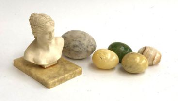 A resin bust of a classical lady; four mineral eggs and one other larger egg