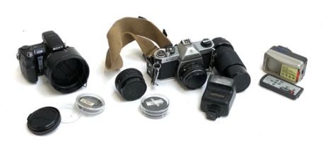 A Pentax K1000 35mm camera, with SMC Pentax-M 1:2 50mm Asahi optical lens; together with a Vivitar
