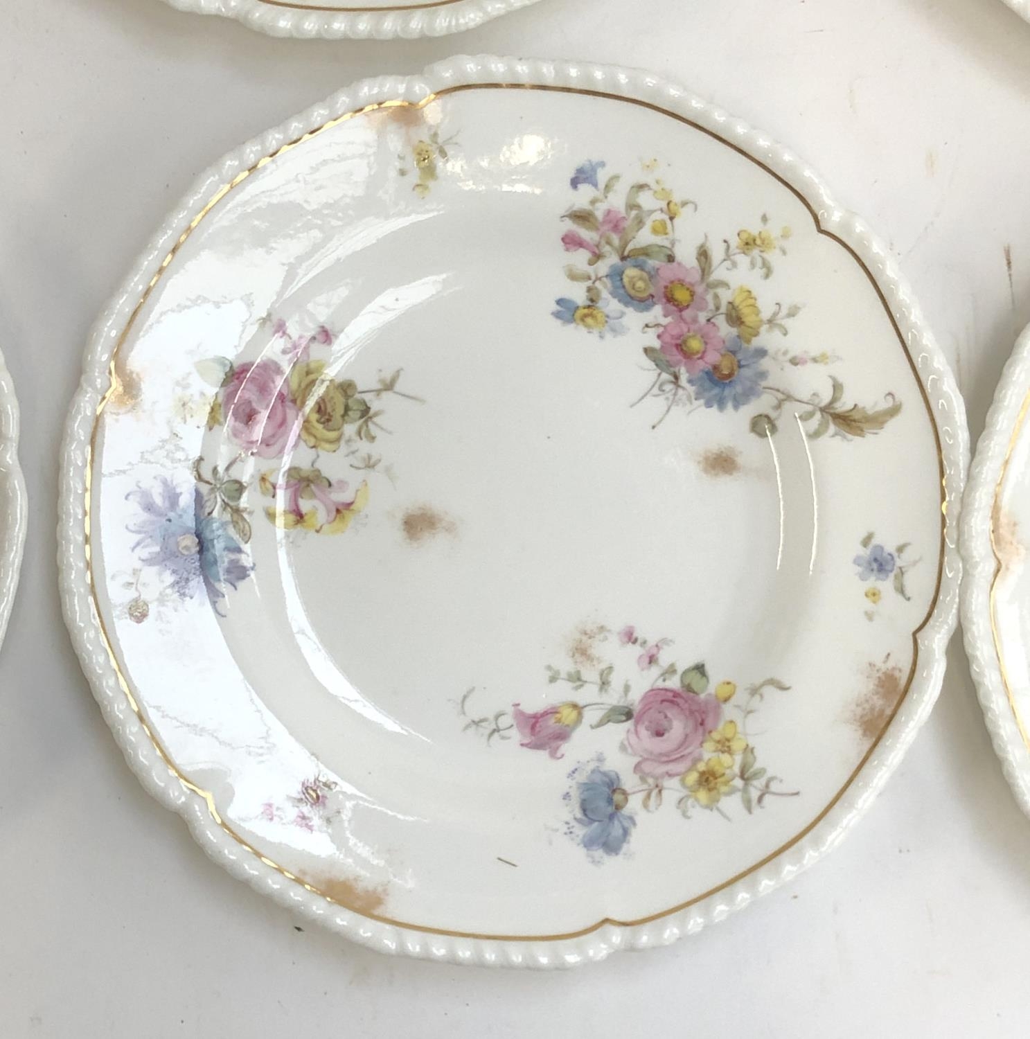 A set of nine Royal Crown Derby dinner plates, hand painted floral spray design heightened in - Image 2 of 3