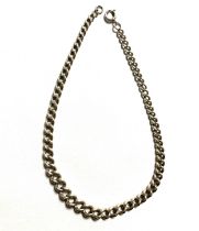 A silver graduating curb link chain, 39cm long unclasped, 37.3g