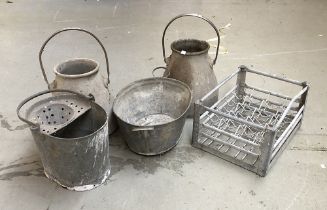 A pair of aluminium milk pails; galvanised bucket; galvanised bottle crate and further bucket