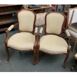 A pair of Louis XV style modern open armchairs