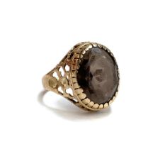 A 9ct gold ring set with a smoky quartz, size P, 5.1g