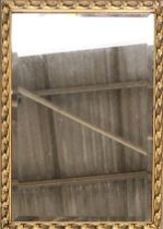 A rectangular gilt framed wall mirror with bevelled glass, 57x40cm