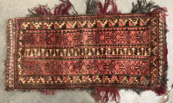 A small saddlebag rug, 115x55cm