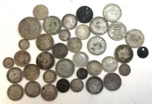 A quantity of pre 1947 silver coins to include four pence 1825, 1845, 1868, three pence 1825,