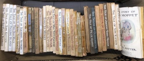 BEATRIX POTTER: Thirty or more books in various states of repair. Some are early - 'gift' dates back