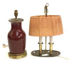 A red glaze table lamp (af), 42cmH overall; together with a further two fitting table lamp