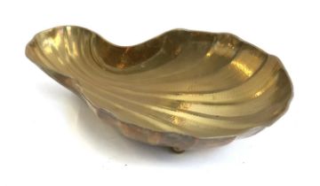 Interior design interest: A large brass fruit bowl in the form of a shell, 51x36cm