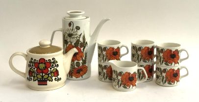 A Sadler teapot with floral design; together with a poppy pattern coffee service