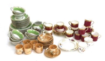 A Victoria Czech green part tea set with fancy bird design; Aynsley coffee cans and saucers with red