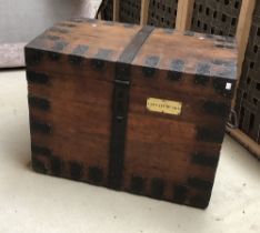 An oak and iron bound silver chest, with double loop handles, green baise fitted interior, brass