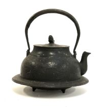 A Japanese cast iron kettle with floral design, 24cmH overall