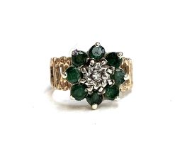 A 9ct gold emerald and diamond cluster ring, size H, 3g